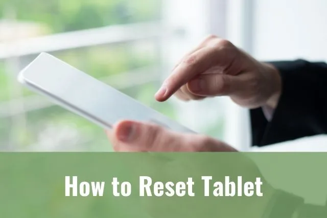Finger tapping on a tablet screen