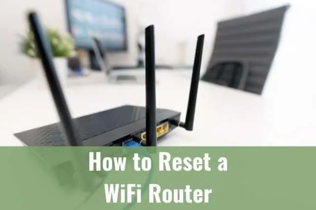 Close up image of back of router that is sitting on a white table