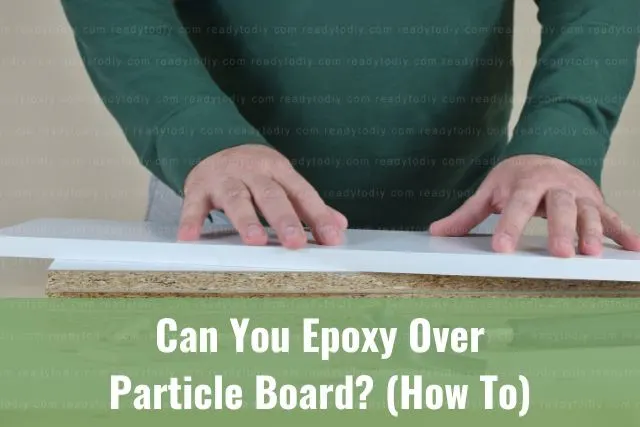 Male preparing particle board