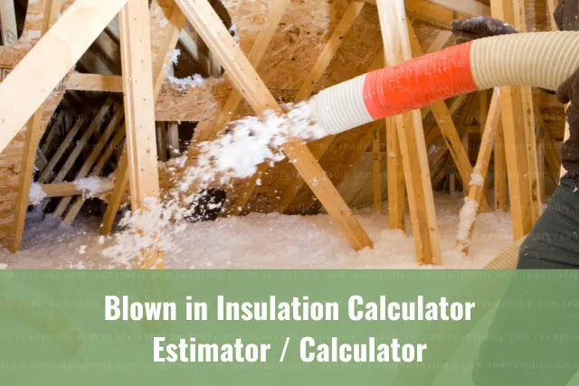 Man putting blown insulation