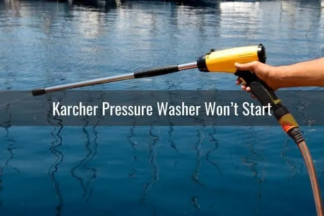 Yellow pressure washer spray