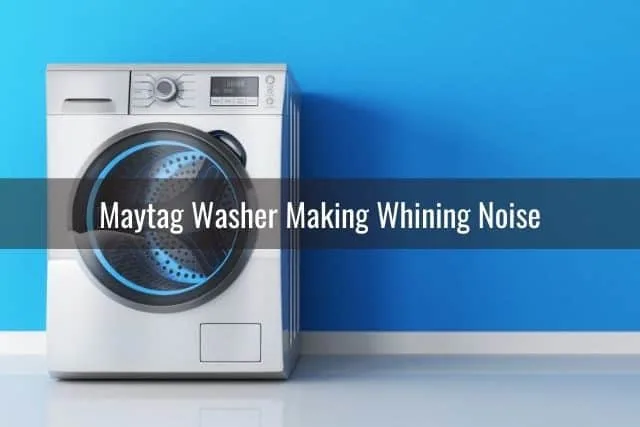Washing machine with blue wall background