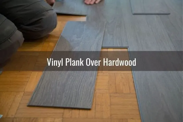 Grey vinyl floor plank over hardwood
