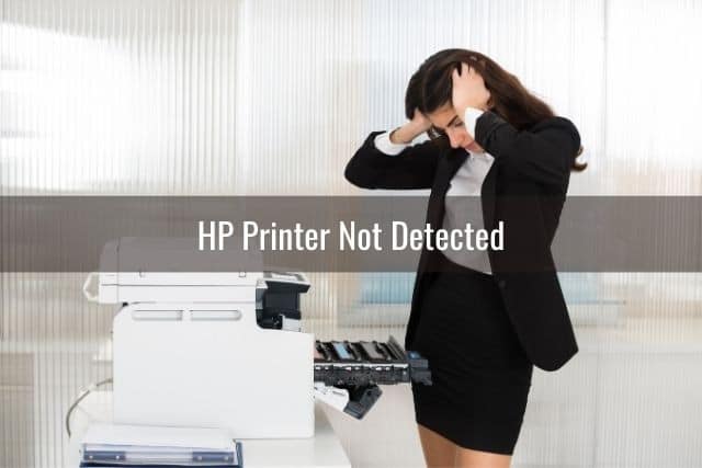Business woman frustrated with printer problems