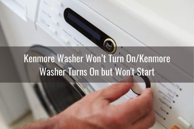 Hand adjusting settings on a front load washing machine