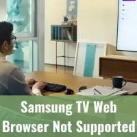 Guy typing on keyboard and looking at TV screen