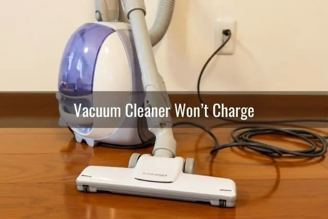 A vacuum that is plugged into a wall outlet