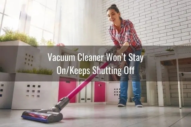 Woman vending over and vacuuming floor