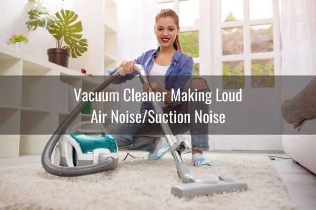 Woman vacuuming white rug