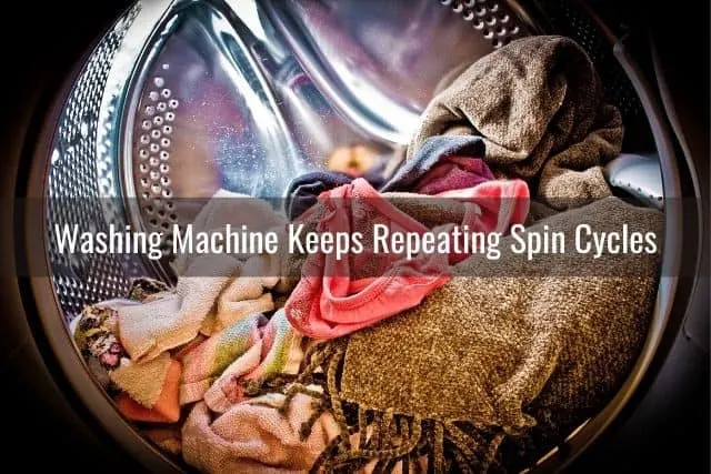 Inside of a washing machine with clothes