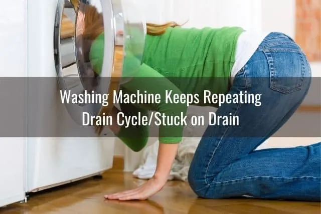 A woman sticking her head inside a washing machine