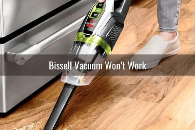 Handheld vacuum on hardwood floor