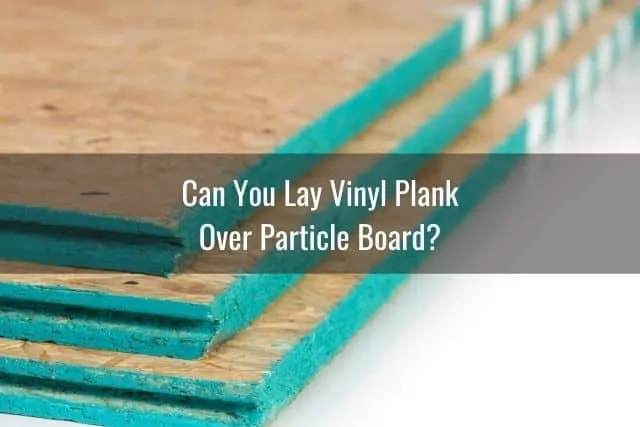 Particle boards stacked on top of each other