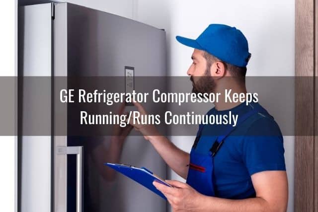 Repairman diagnosing refrigerator problems