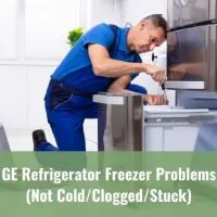 Repairman fixing refrigerator freezer