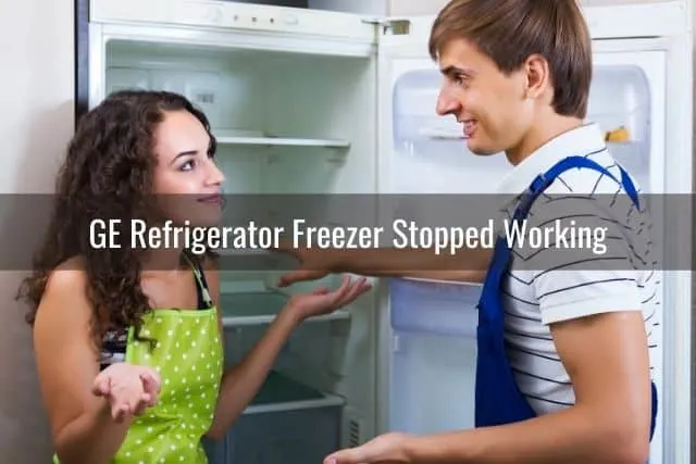 Repairman explaining refrigerator problems to woman