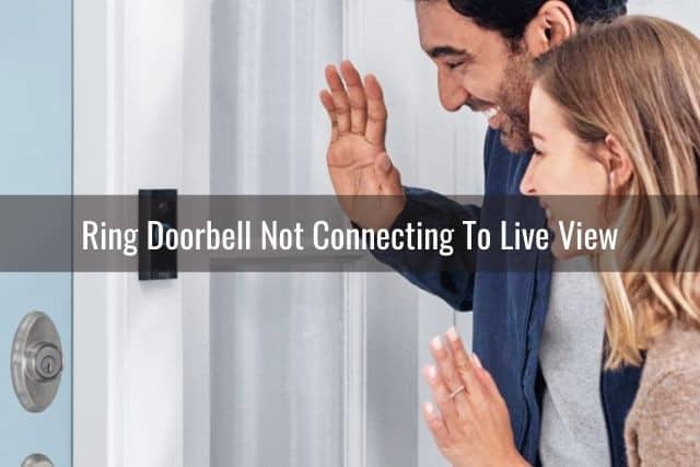 A couple waving at a video camera doorbell