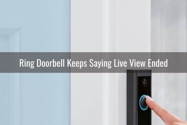 Finger pressing on video camera doorbell