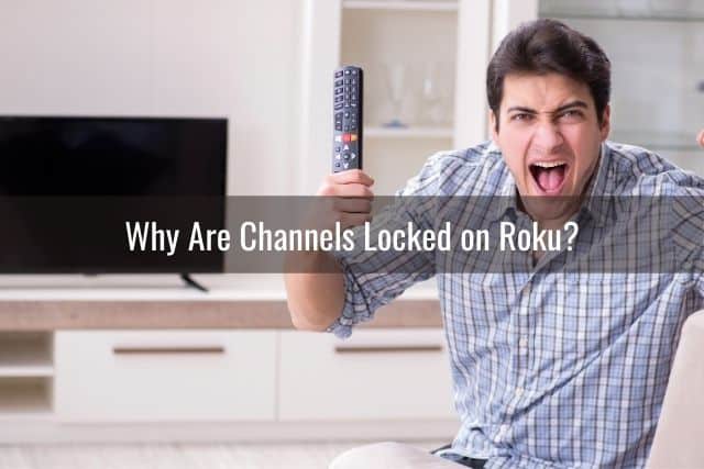Angry male yelling while holding a TV remote in hand