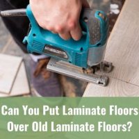 Laminate floor plank being cut by a saw