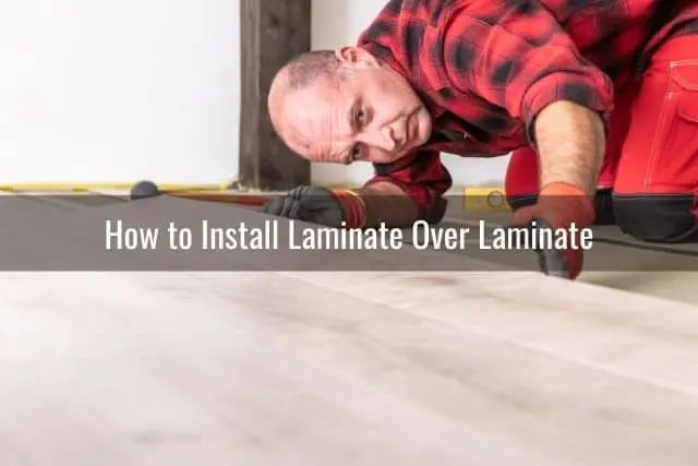 Male installing laminate flooring