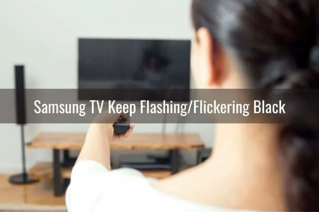Female pointing a remote at TV to turn on