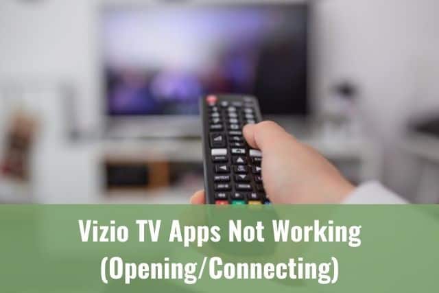 Remote being used to changed channels on a TV