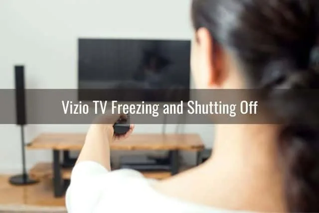 Female turning TV off