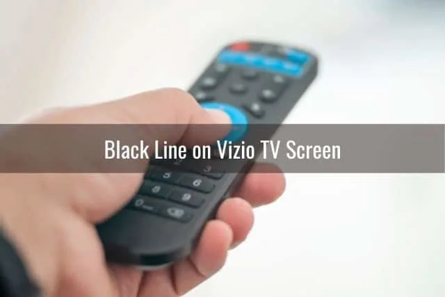 TV remote being used to change channels