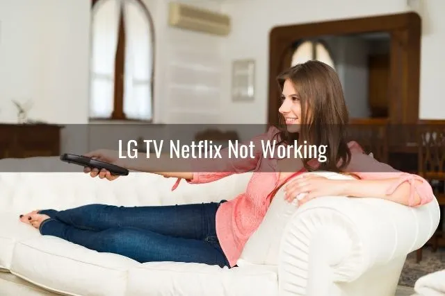 Female smiling and using remote to TV channel surf