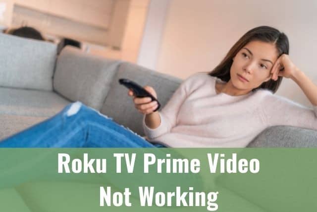 Female changing channels with TV remote