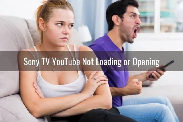 Male and female couple not happy about TV programming