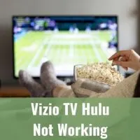 Person watching tennis on TV and eating popcorn