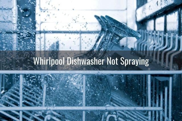 Dishwasher water spray on dishes