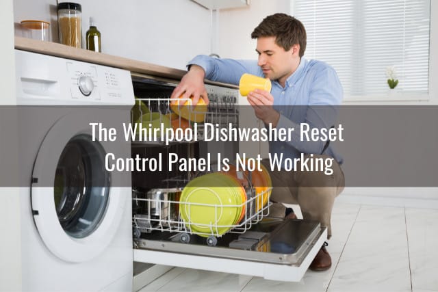 Man arranging dishes in dishwasher