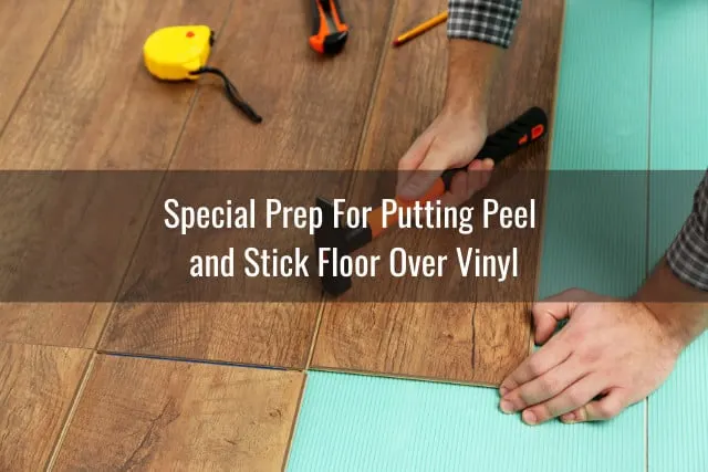 Man installing laminate vinyl flooring