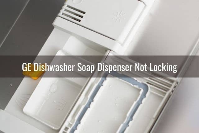 Dishwasher soap compartment