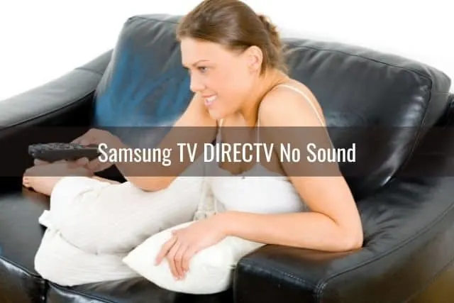 Female changing TV channels with remote