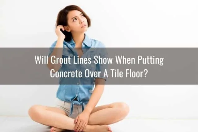 Female sitting on ground confused and thinking while scratching head