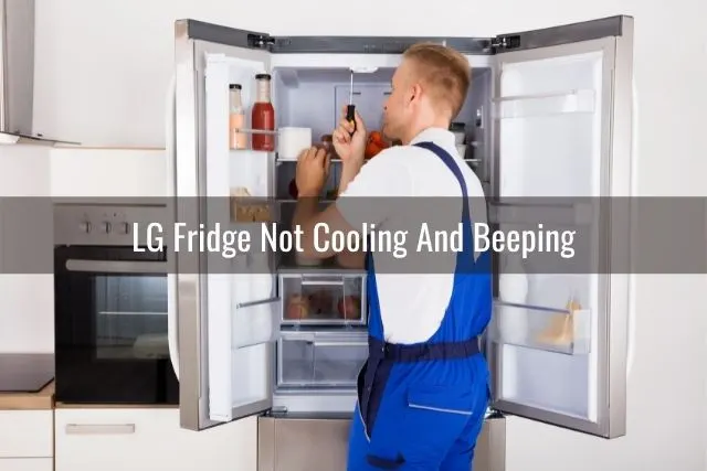 Repair man fixing refigerator