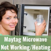 Woman putting cup inside the microwave