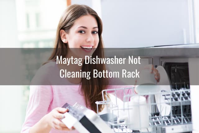 Woman closing the dishwasher