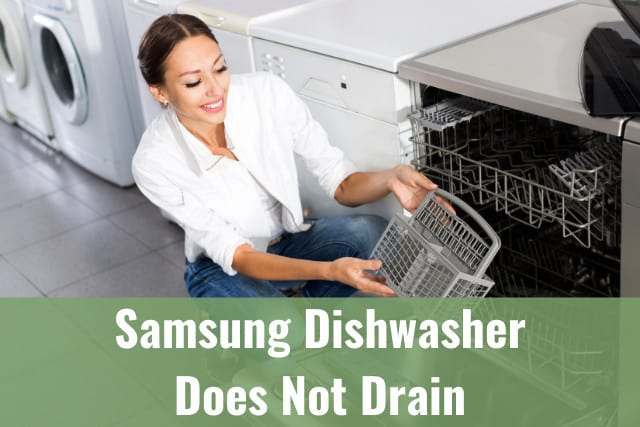 Woman holding a drain of dishwasher