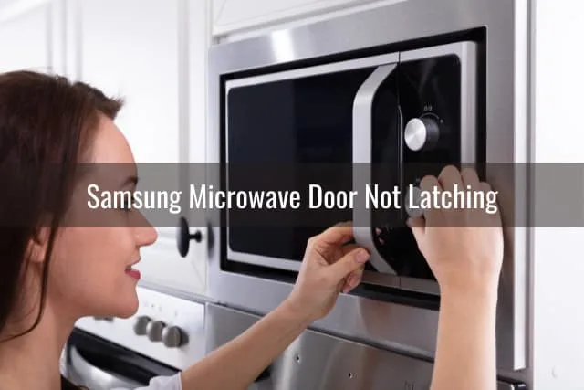Woman adjusting the microwave