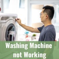Man adjusting the start button of washing machine