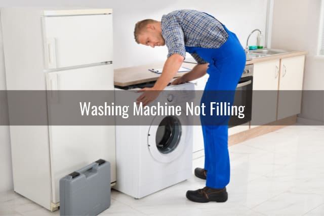 Man fixing the washing machine