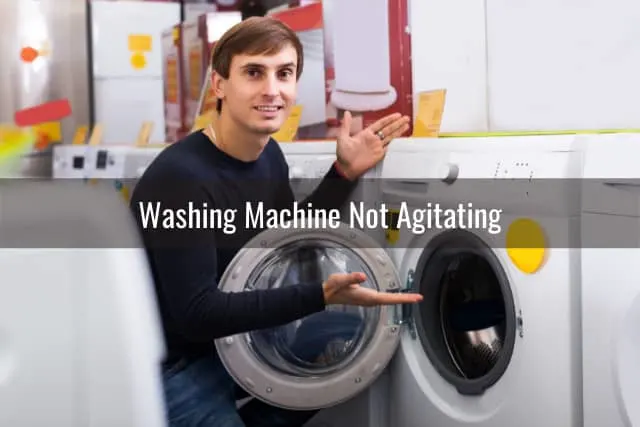 Man showing the washing machine