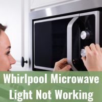 Woman adjusting the microwave