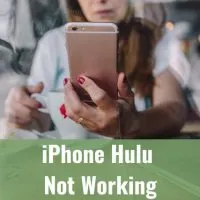 Woman holding Iphone