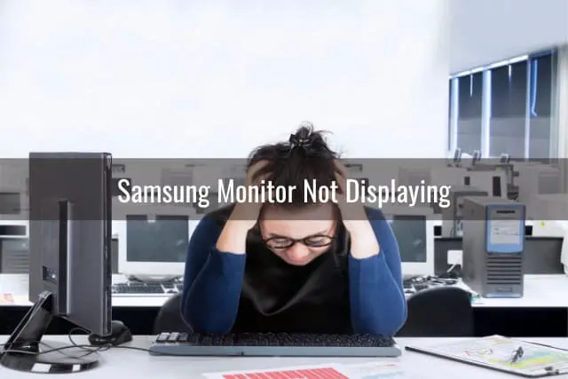 Frustrated woman while looking at the monitor